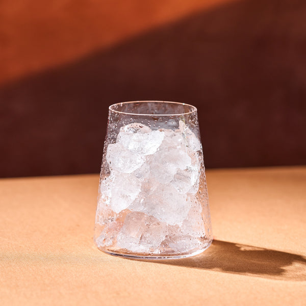 Fill glass with ice